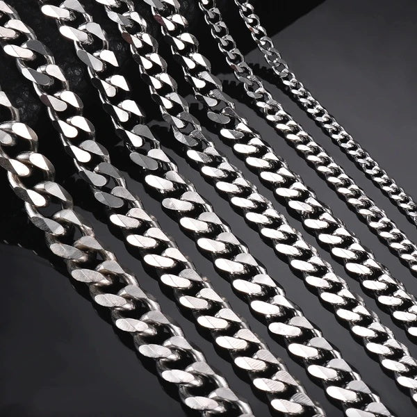 Stainless steel Cuban chain link texture close-up, multiple widths