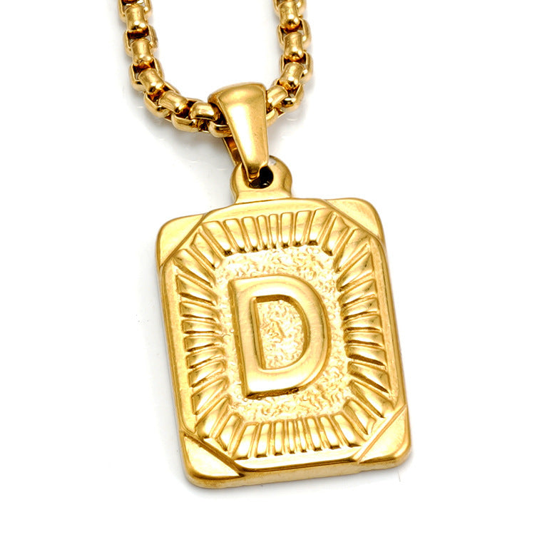 The Initial gold stainless steel letter D pendant, studio shot