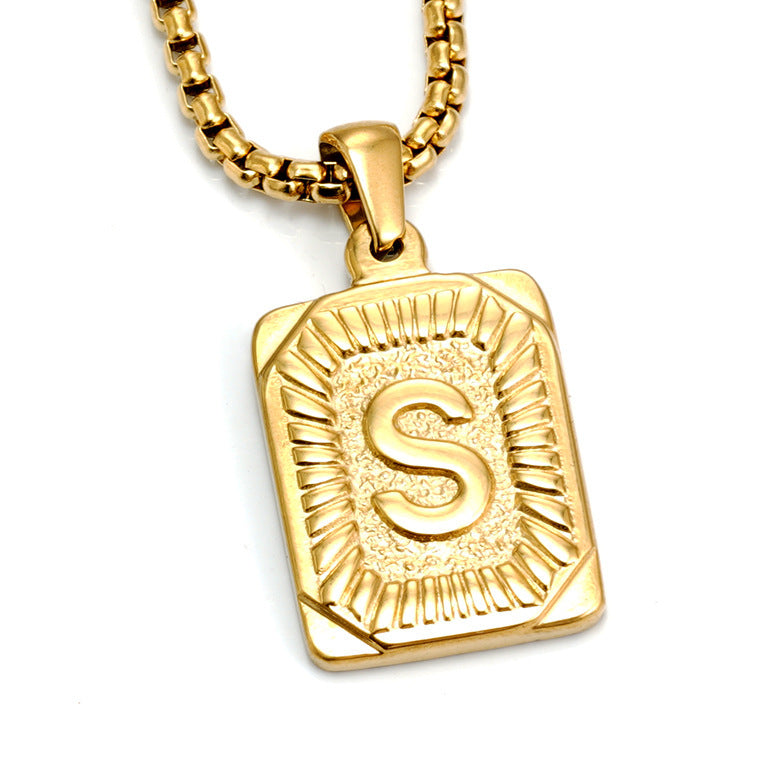 The Initial gold stainless steel letter S pendant, studio shot