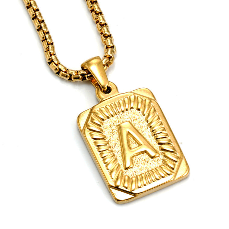 The Initial gold stainless steel letter A pendant, studio shot