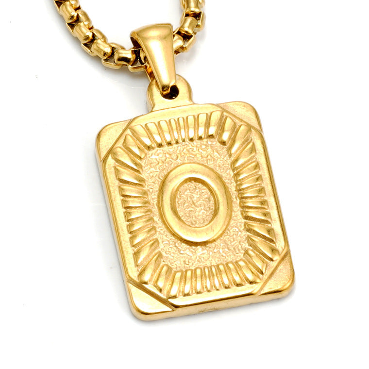 The Initial gold stainless steel letter O pendant, studio shot