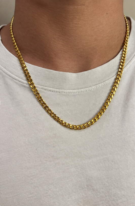 The Everyday Cuban 5mm gold Cuban link chain worn with a white t-shirt