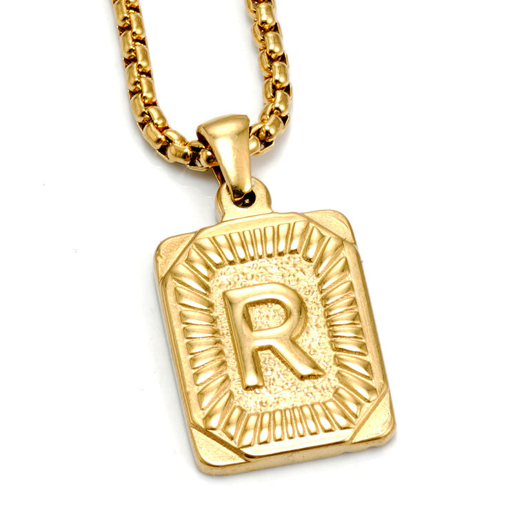 The Initial gold stainless steel letter R pendant, studio shot