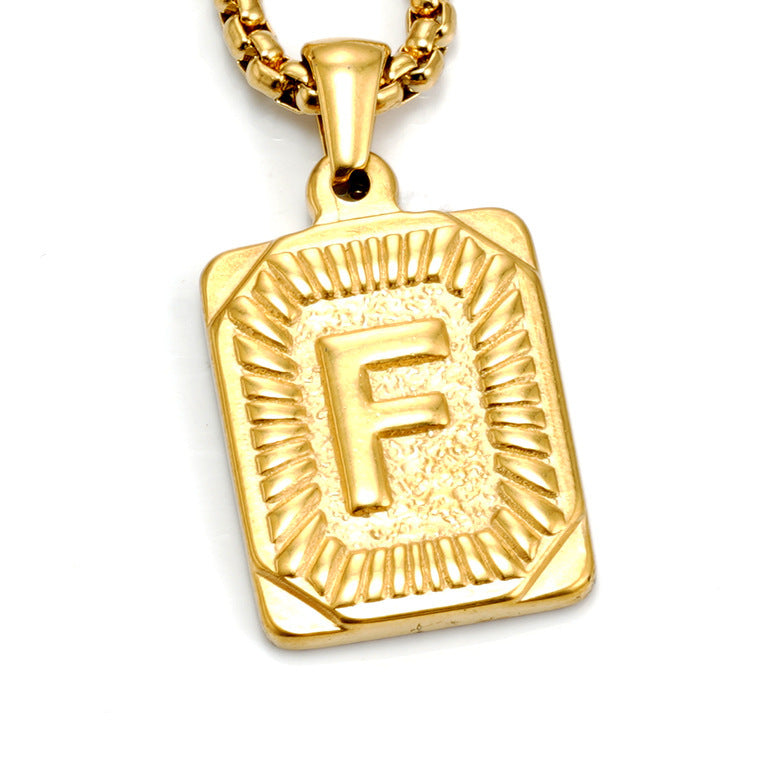 The Initial gold stainless steel letter F pendant, studio shot