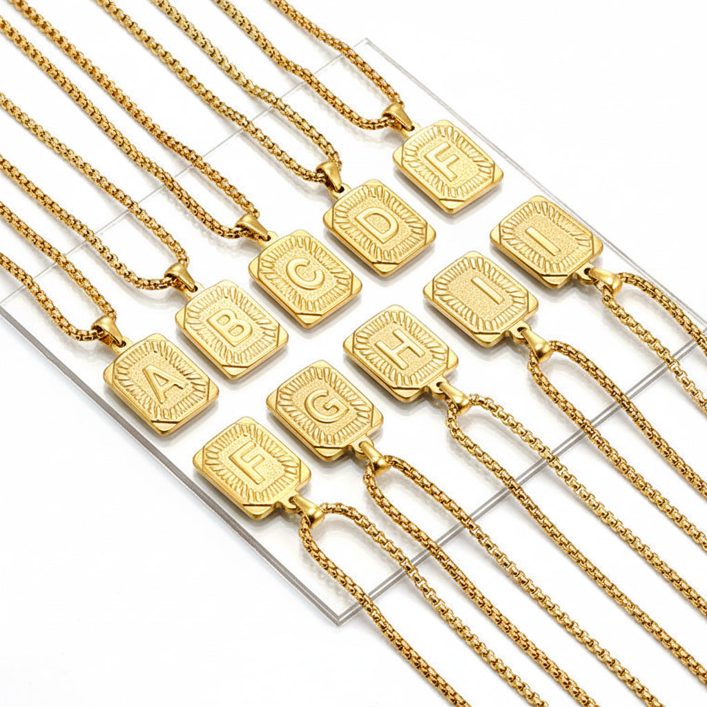 Gold stainless steel letter pendant necklaces on box chains, letters A through I