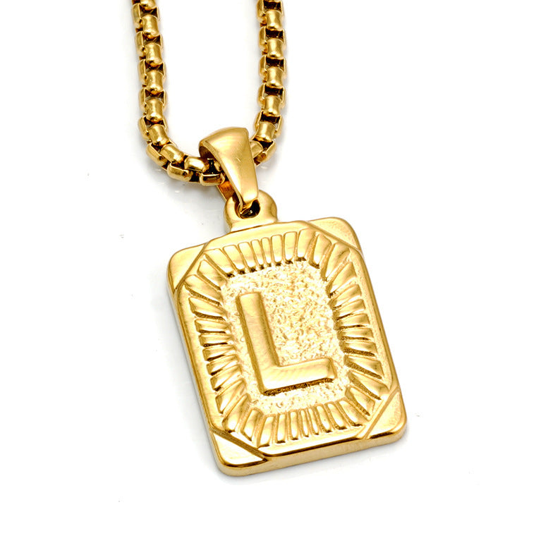 The Initial gold stainless steel letter L pendant, studio shot