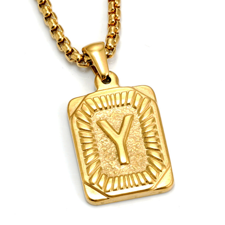 The Initial gold stainless steel letter Y pendant, studio shot